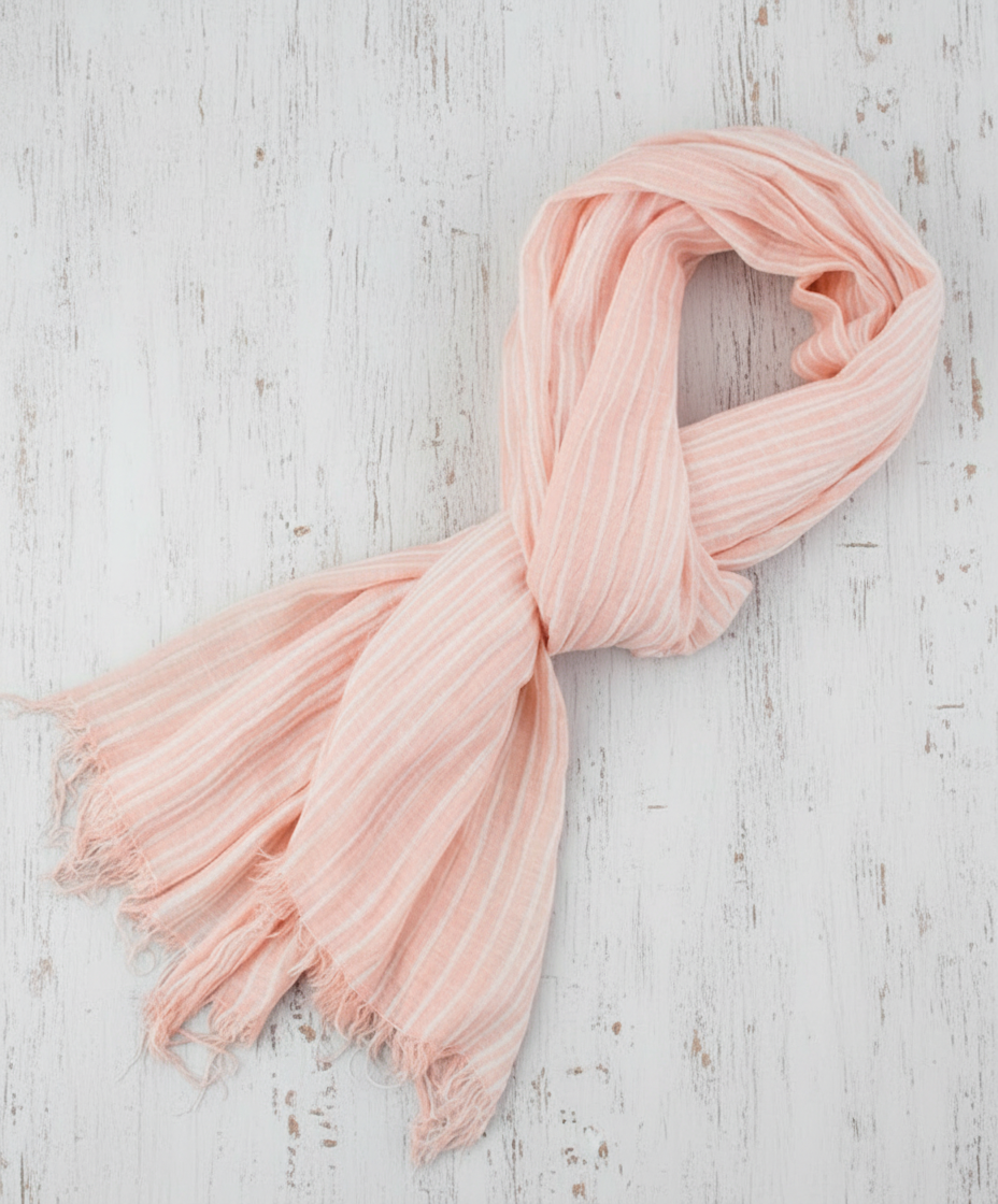Pink scarf on a gray background