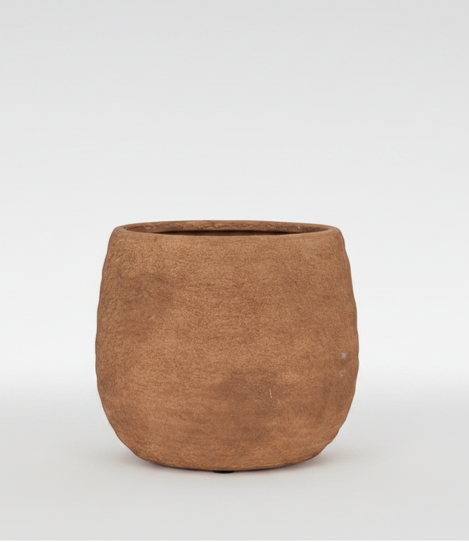 Brown terracotta pot on a white background