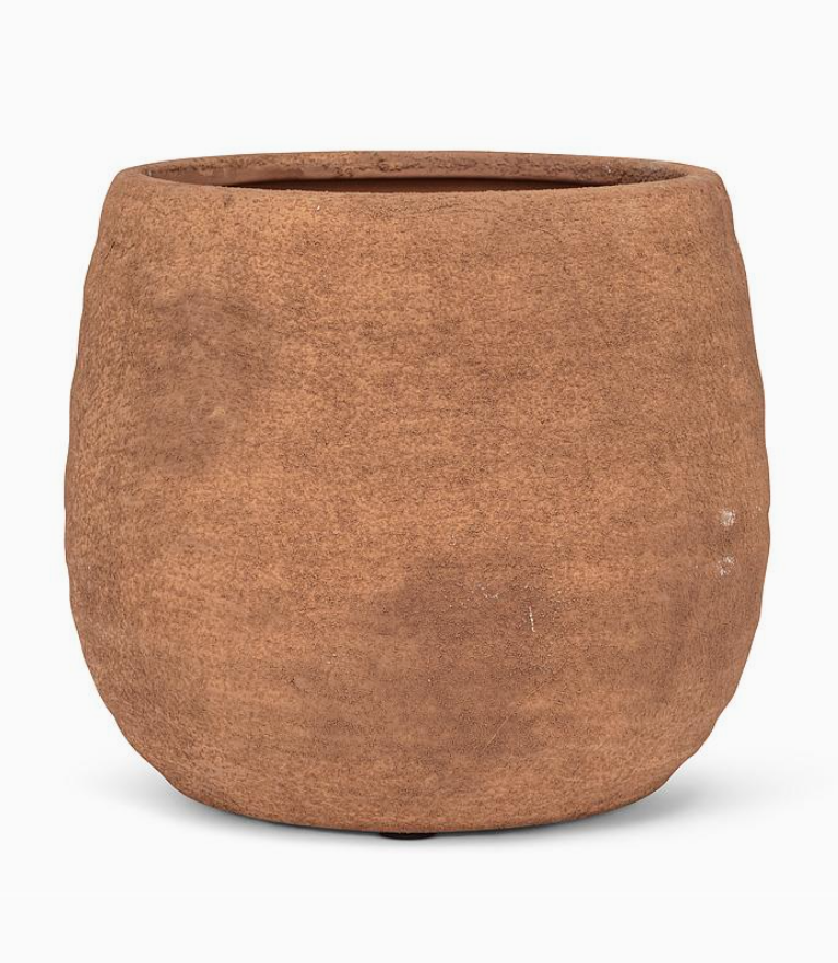 Brown terracotta pot on a white background