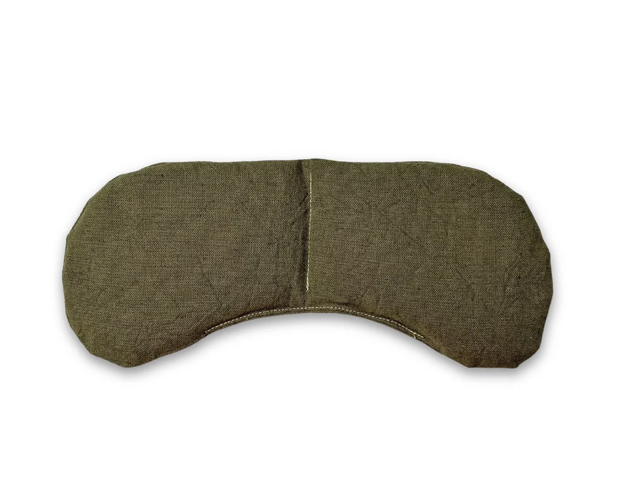 Green sleep mask on a white background