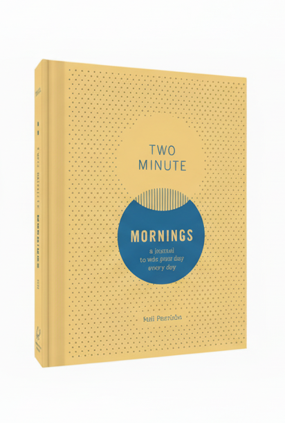 Yellow journal titled 'Two Minute Mornings' with blue circle 