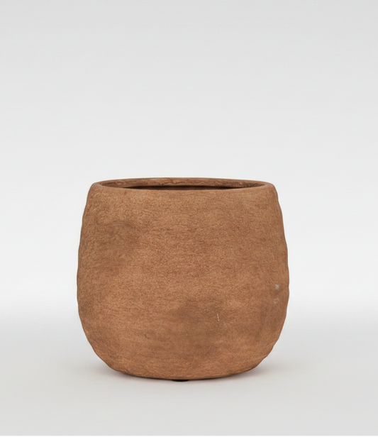 Brown terracotta pot on a white background