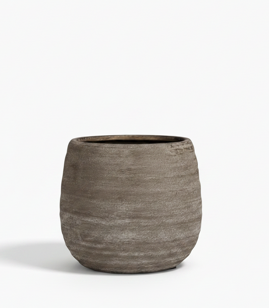 Textured brown pot on a white background