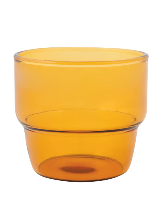 An amber-colored translucent plastic tumbler with a flared rim, shown against a plain white background.