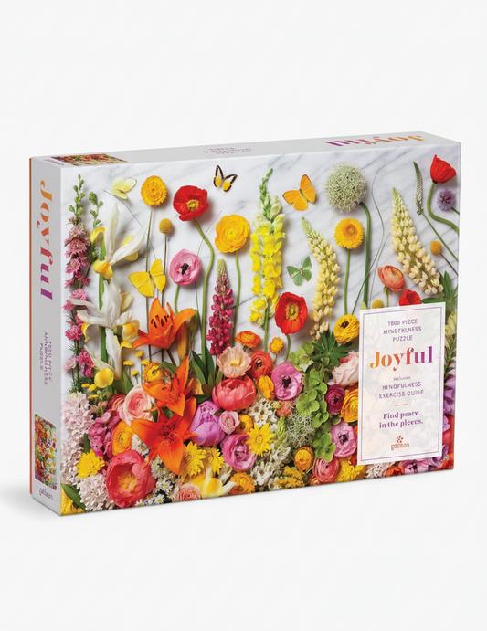 Jigsaw puzzle box with colorful floral design 